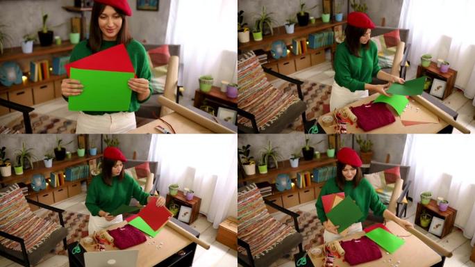 创意女性视频记录器将在她的频道上直播，同时解释如果您想为圣诞节礼物创建一些有趣的包装，那么轻松DIY