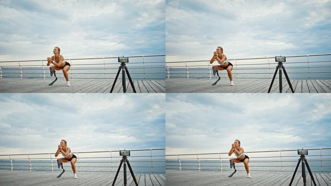 残疾妇女录制励志视频教程，在海边锻炼