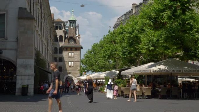 日内瓦市中心晴天著名购物街拥挤广场慢动作全景4k瑞士