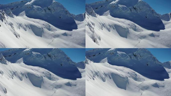 4k航拍画面，滑雪登山者在滑雪巡回赛和登山比赛中参加比赛