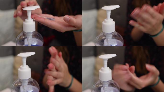 年轻漂亮的女商人在咖啡店使用洗手液作为适当的卫生礼仪
