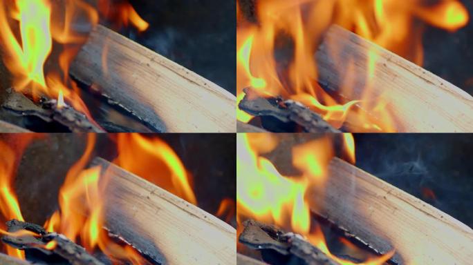 木头在火焰中冒出浓烟。
