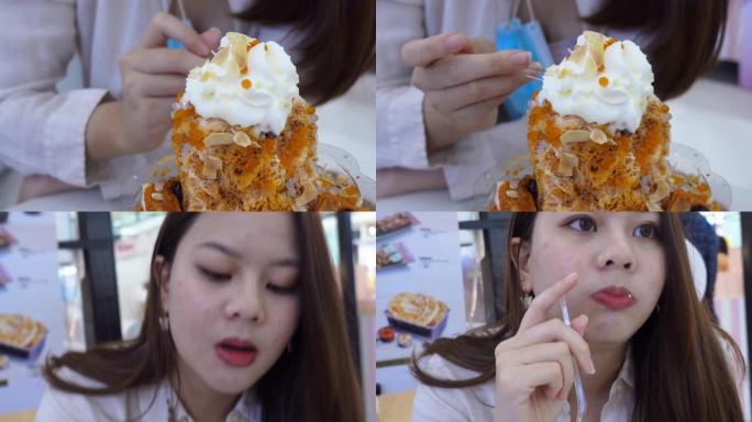 亚洲vlogger少女秀在咖啡店吃冰苏
