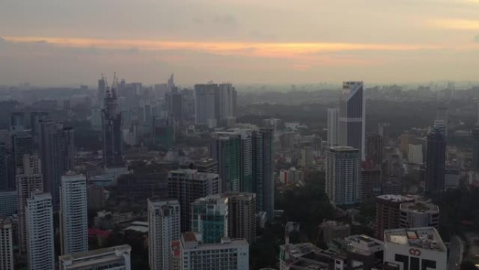 吉隆坡日落天空城市景观建设航空全景4k马来西亚