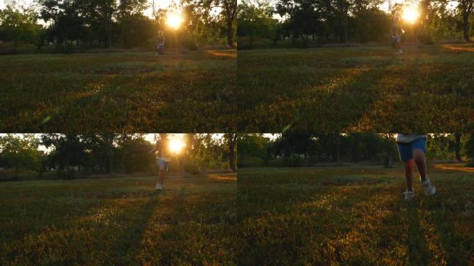 年轻女孩走在五颜六色的红绿秋草后面。穿着运动鞋的小孩走在森林小径上。穿着鞋子的孩子在小路上奔跑。户外