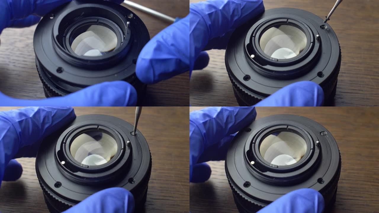 修理相机镜头拆卸镜头和机械零件特写