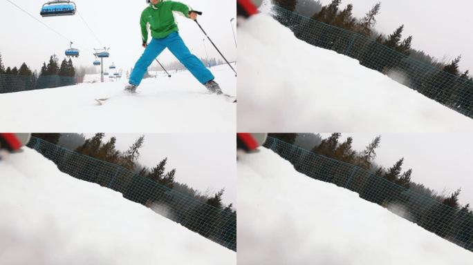 滑雪者在电缆下下坡并摔倒撞倒摄像机的动作视频