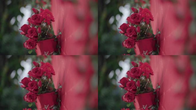 4k装饰红玫瑰和红花背景，情人节主题，情人浪漫时刻，婚礼当天，幸福快乐，许愿，绿叶，林木，恋爱关系，