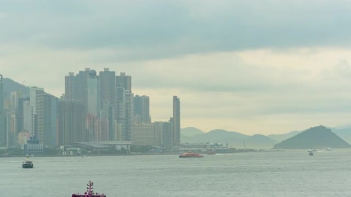 时光流逝: 多云的香港城市摩天大楼-现代城市商业区