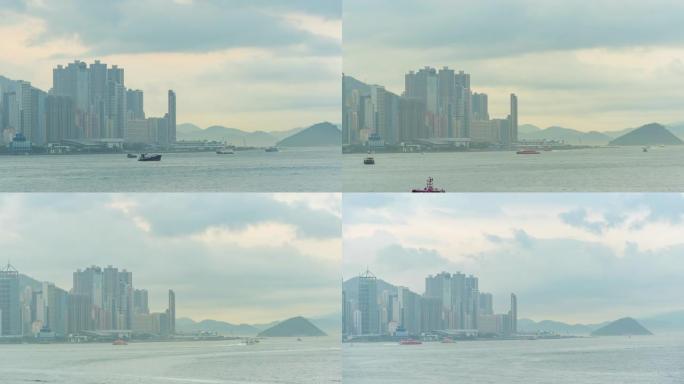时光流逝: 多云的香港城市摩天大楼-现代城市商业区
