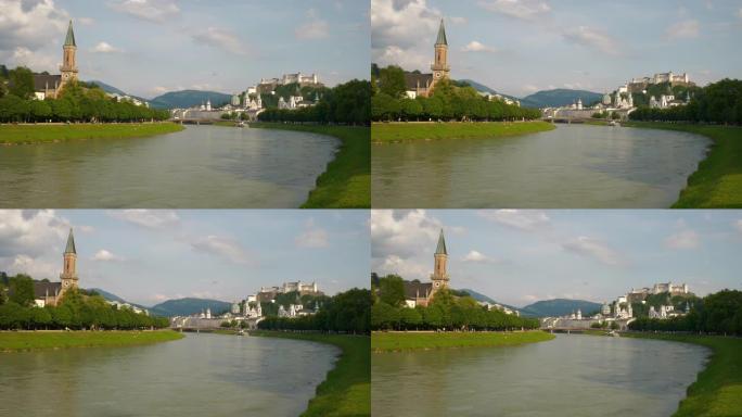 日落时间萨尔茨堡中心著名的河流城市景观慢动作全景4k奥地利