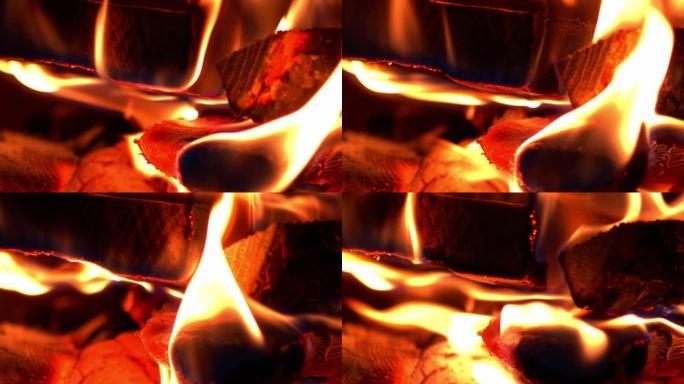 木头炉子里燃烧的木头碎片的火焰