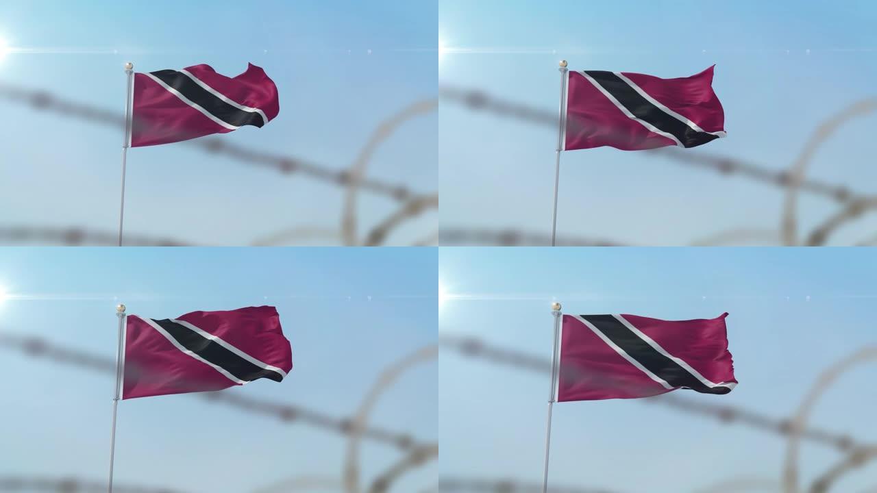 身后挂着特立尼达和多巴哥的旗帜