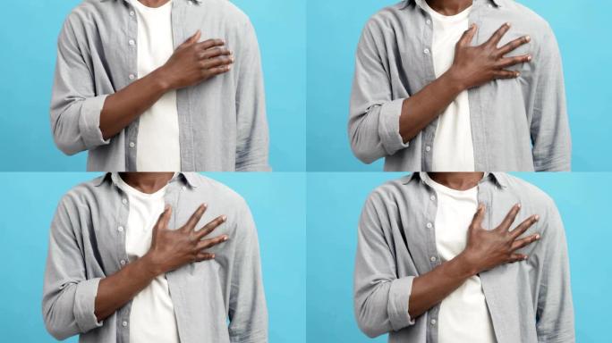 无法识别的非洲裔美国人按摩胸部，遭受心脏疼痛
