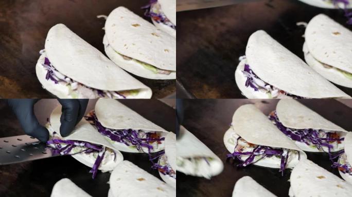 墨西哥食物 -- 美味的玉米卷和碎牛肉。烹饪过程