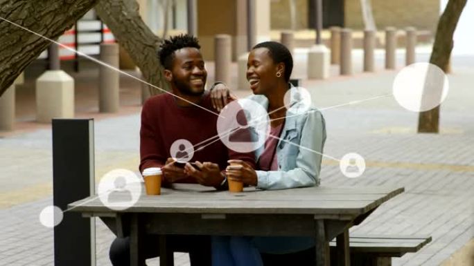 与人联系网络的动画在非裔美国夫妇的笑声中
