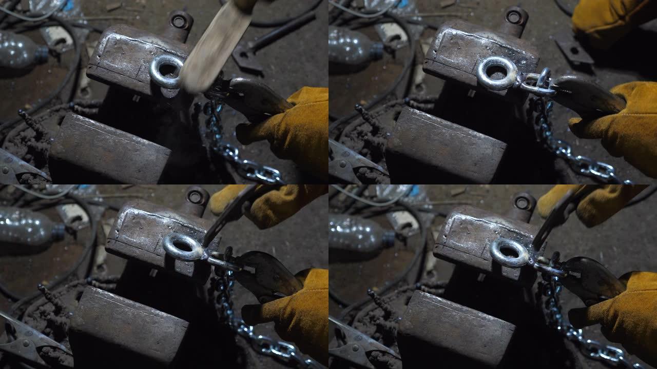 使用锤子清洁金属上的焊剂屏蔽的人