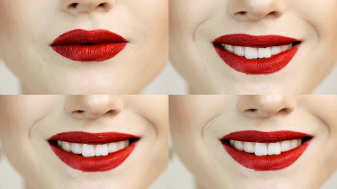 红色唇膏和白色牙齿。这个女人快乐而微笑。