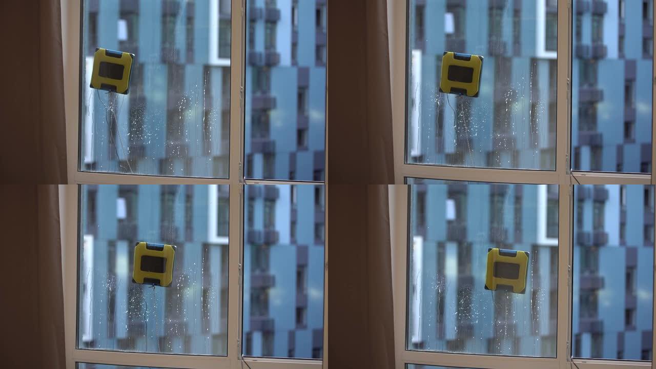 现代擦窗机器人正在工作。吸尘器机器人清洁室外公寓窗户。客房保洁服务理念。4 k的视频