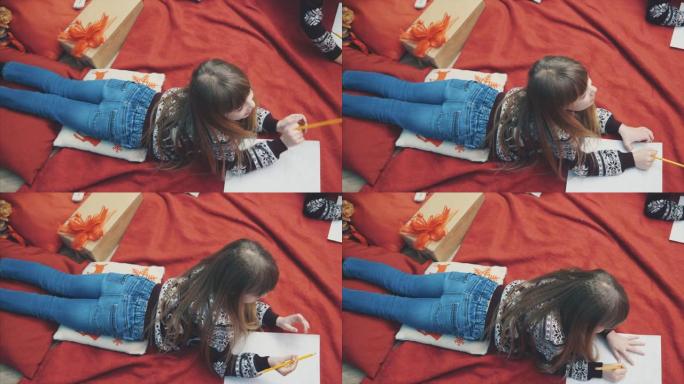金发女孩想在冬天晚上躺在红色毯子上给Nord Pole的信中写些什么。