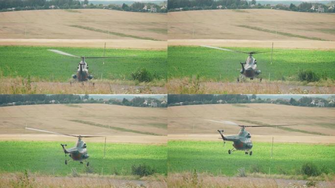 一架直升机在夏季晴天从野外起飞