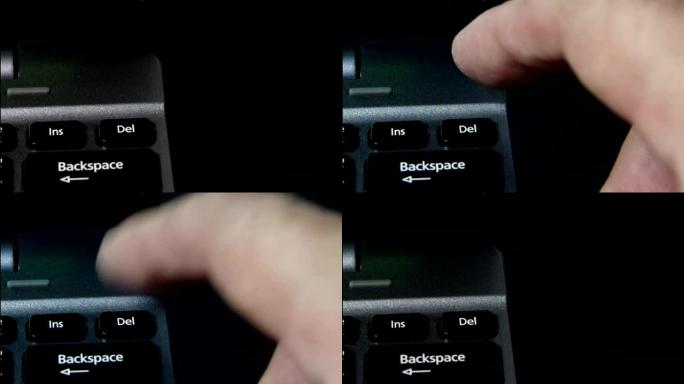 笔记本键盘上的手指点击删除按钮