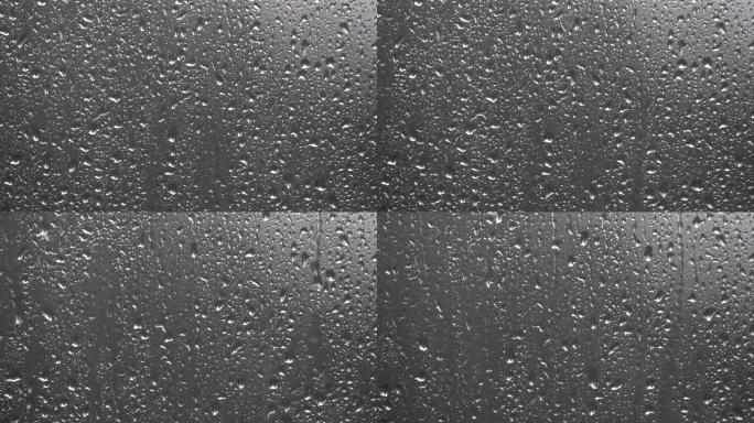 窗户雨滴的镜头浴室玻璃散焦