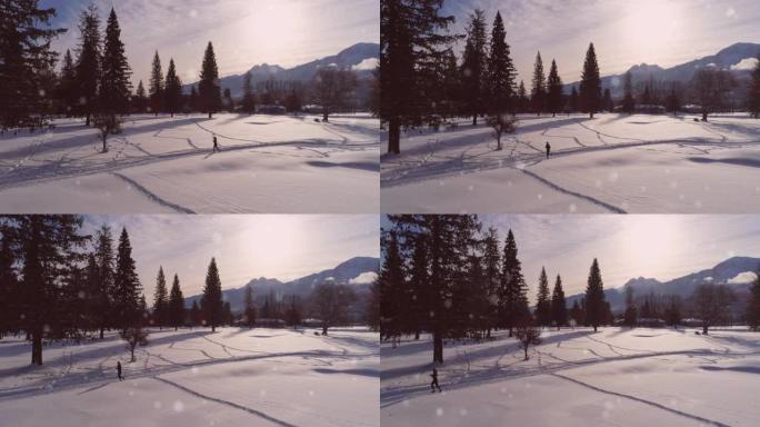 雪花落在冬季风景中奔跑的女人身上
