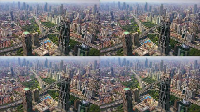 白天上海城市景观著名交通路口空中全景4k倾斜移位中国