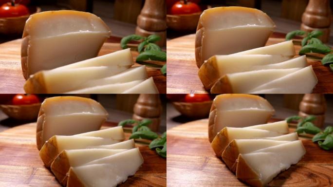 半硬羊奶酪切成三角形的特写全景