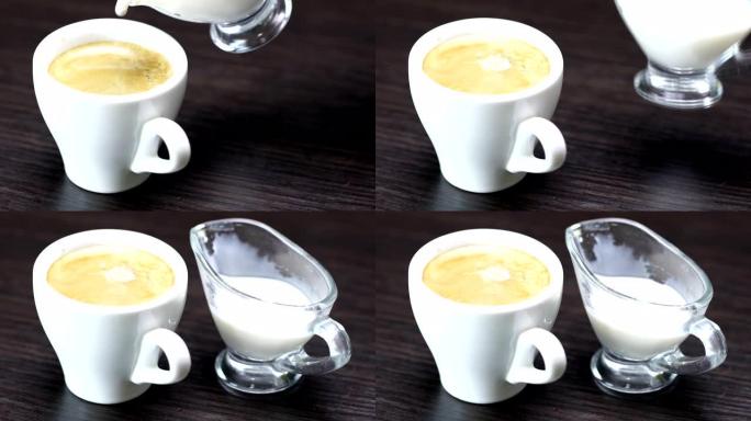 奶油倒入装有热咖啡的杯子中