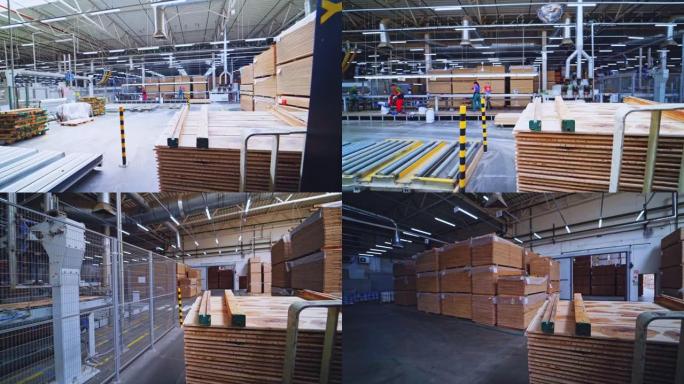 木材仓库。巨大的工厂里堆着木板，用于拼花生产。搬运木质材料的电子推车。