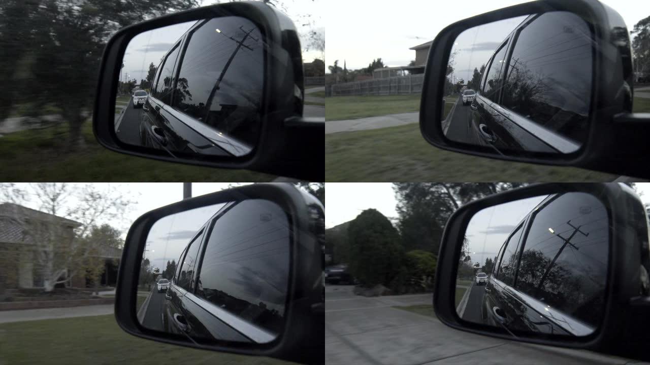 在夏日，驾驶POV透过车窗看。侧视图，在夏日穿越澳大利亚墨尔本