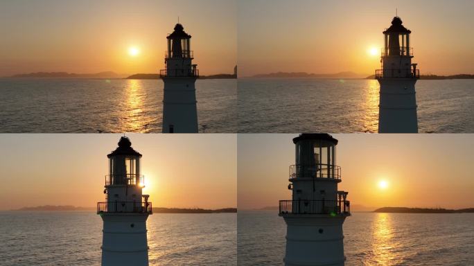 夕阳中航拍海边灯塔视频