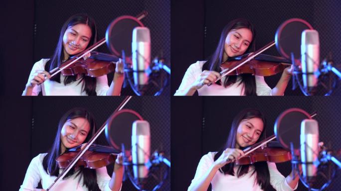美丽的小提琴手拉小提琴