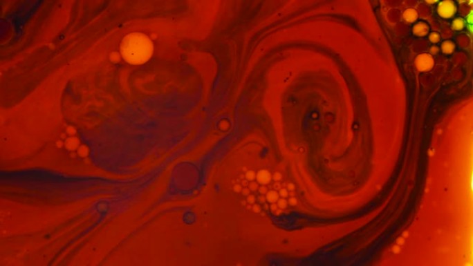 迷幻的液体光在水，油，油漆，液体和脉冲气泡中带有奇怪的墨水图案。真实的60年代迪斯科油轮特写细节。前