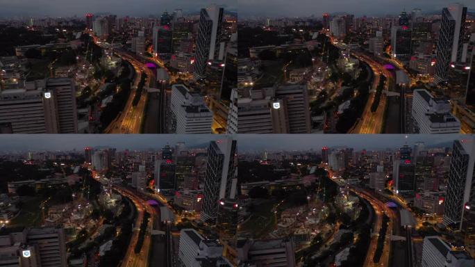暮光之夜照明吉隆坡市中心交通街空中全景4k马来西亚