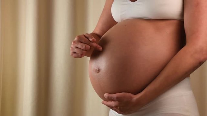 孕妇用手摸肚子孕肚孕肚肚子孕妈妈