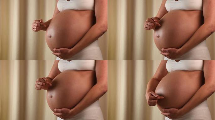 孕妇用手摸肚子孕肚孕肚肚子孕妈妈