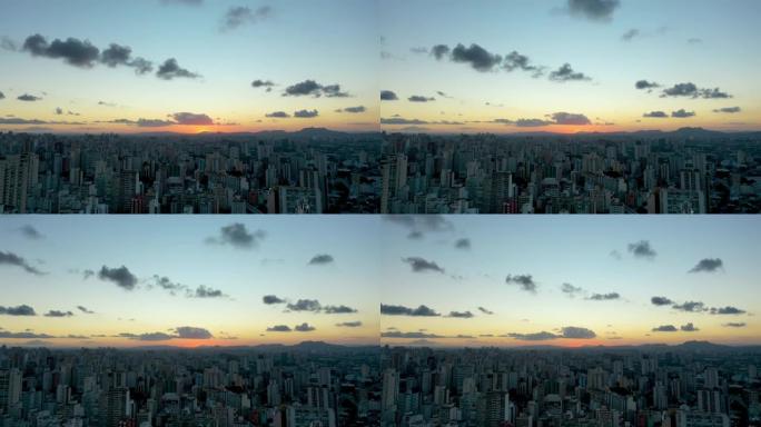 巴西圣保罗首都的延时日落。市区过度失误。城市生活场景。巴西圣保罗区的鸟瞰图。五颜六色的天际线。景观。