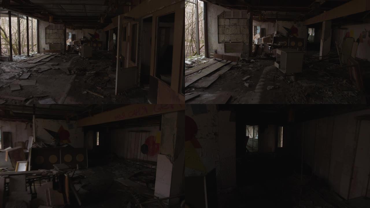 乌克兰切尔诺贝利地区的普里皮亚季镇。Steadicam向可怕的废弃建筑开枪。