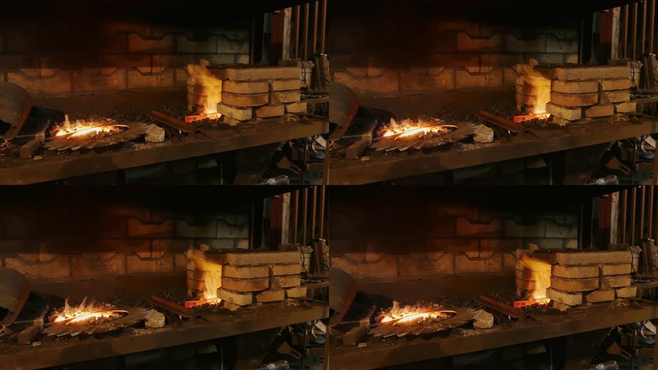 在炉子里生火。铁匠在炉子里炼钢。铁匠锻造的硬化和加热铁。铁匠为制造壁炉、火炉而炼铁。