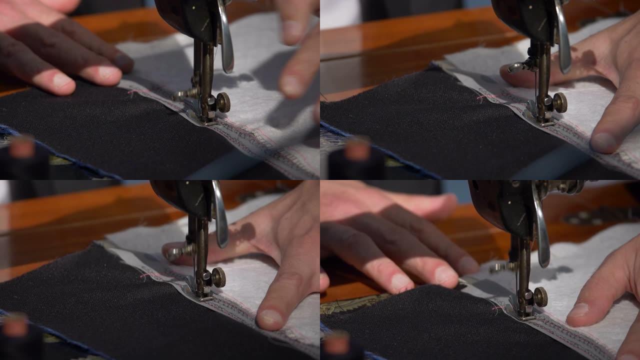 裁缝在缝纫机上缝制两块布的镜头