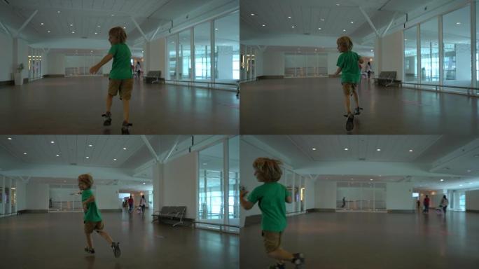 慢镜头拍摄一个小男孩，他手里拿着白色玩具飞机穿过机场。自由概念。童年的概念。儿童旅游概念