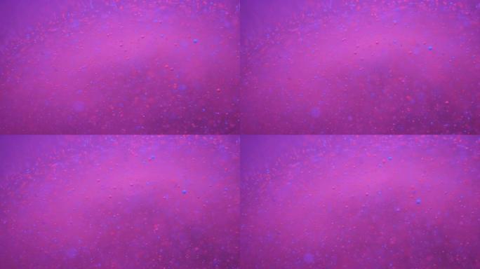 彩色气泡油美丽油漆紫色宇宙移动。太空星系行星。星云太空恒星行星。银河系。