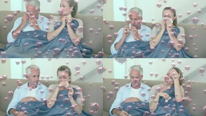 漂浮在白人夫妇坐在沙发上打喷嚏的巨集新型冠状病毒肺炎细胞的动画