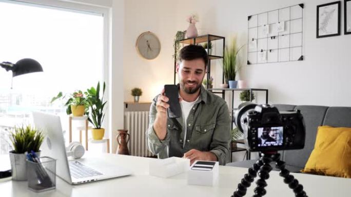 如何成为技术影响者-为他的vlog拆箱最新的智能手机