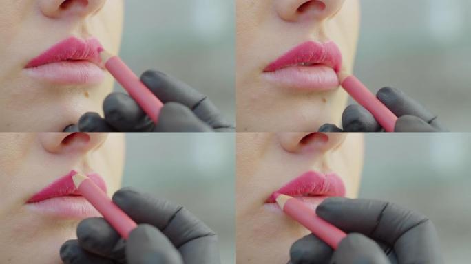 微刀片，微色素沉着的嘴唇在美容院工作。女人用铅笔画嘴唇并着色，准备半永久性化妆。