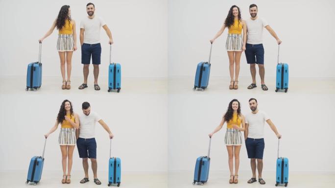 4k slowmotion的视频，情侣在度假前在去机场的路上拖着行李。假期的概念。