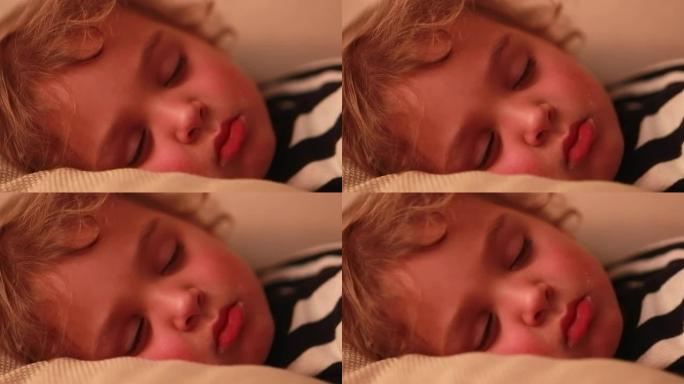 儿童沉睡的小男孩深度睡眠接孩子frpm深度睡眠